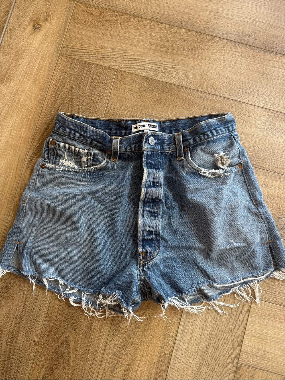 Re/Done Faded Blue Distressed High-Rise Denim Shorts
